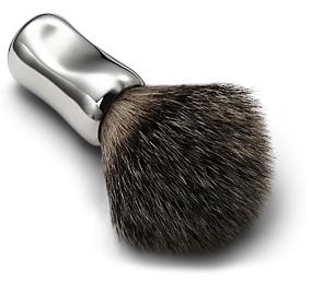 Thumbprint shaving brush in sterling silver.$325