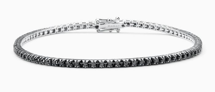 RABAT. Pulsera rivière de oro blanco con brillantes negros – 1.450€